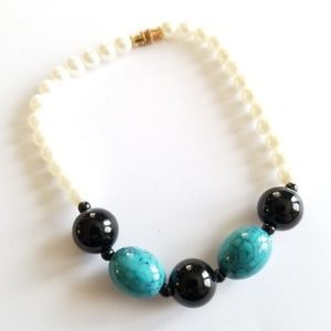Beaded bracelet faux pearls black blue plastic beads